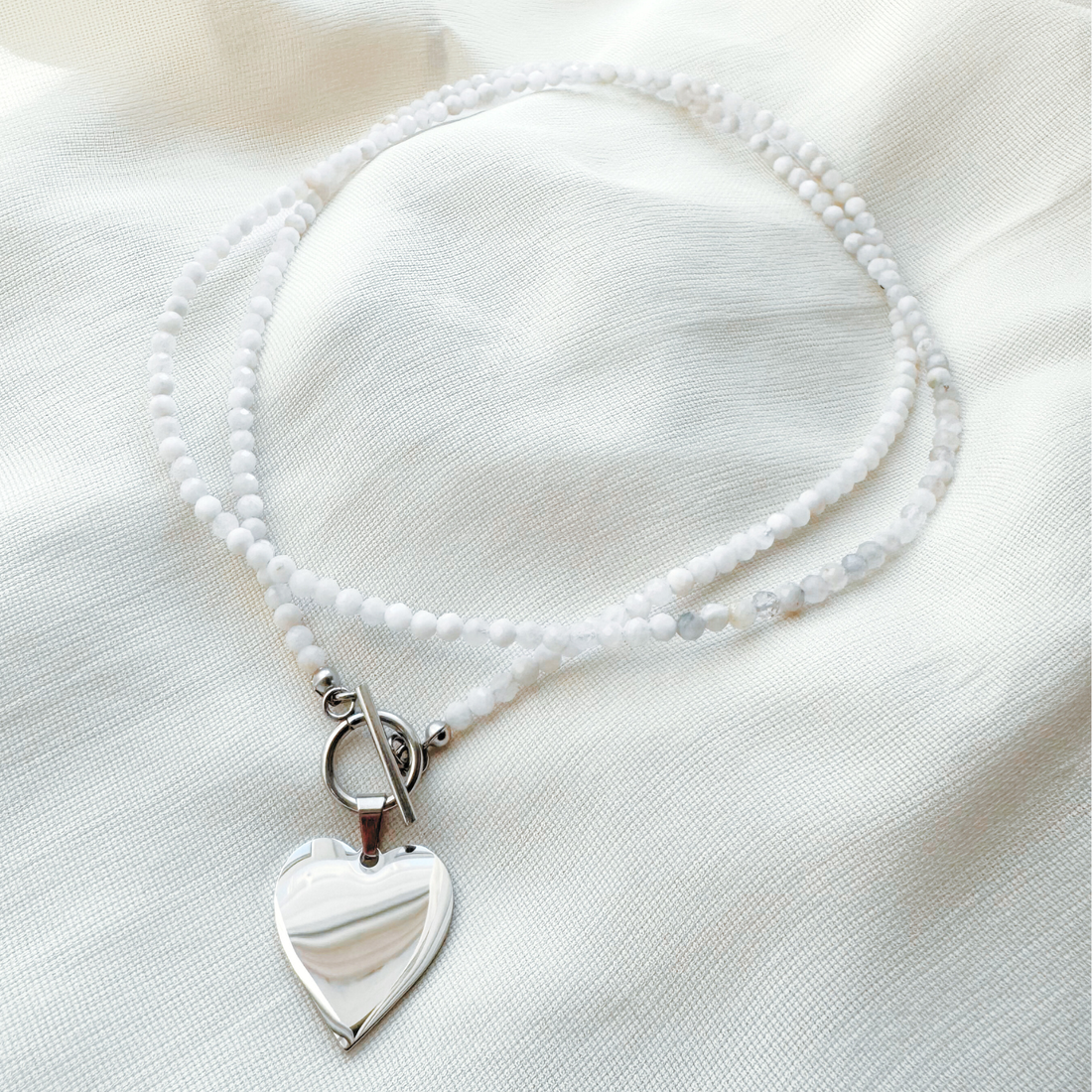 Colier / choker dublu la baza gatului cu piatra lunii si pandativ inima - bijuterii - coliere - coliere cu multiple șiruri - Artynos.ro Colier / choker dublu la baza gatului cu piatra lunii si pandativ inima - bijuterii - coliere - coliere cu multiple șiruri - Artynos.ro