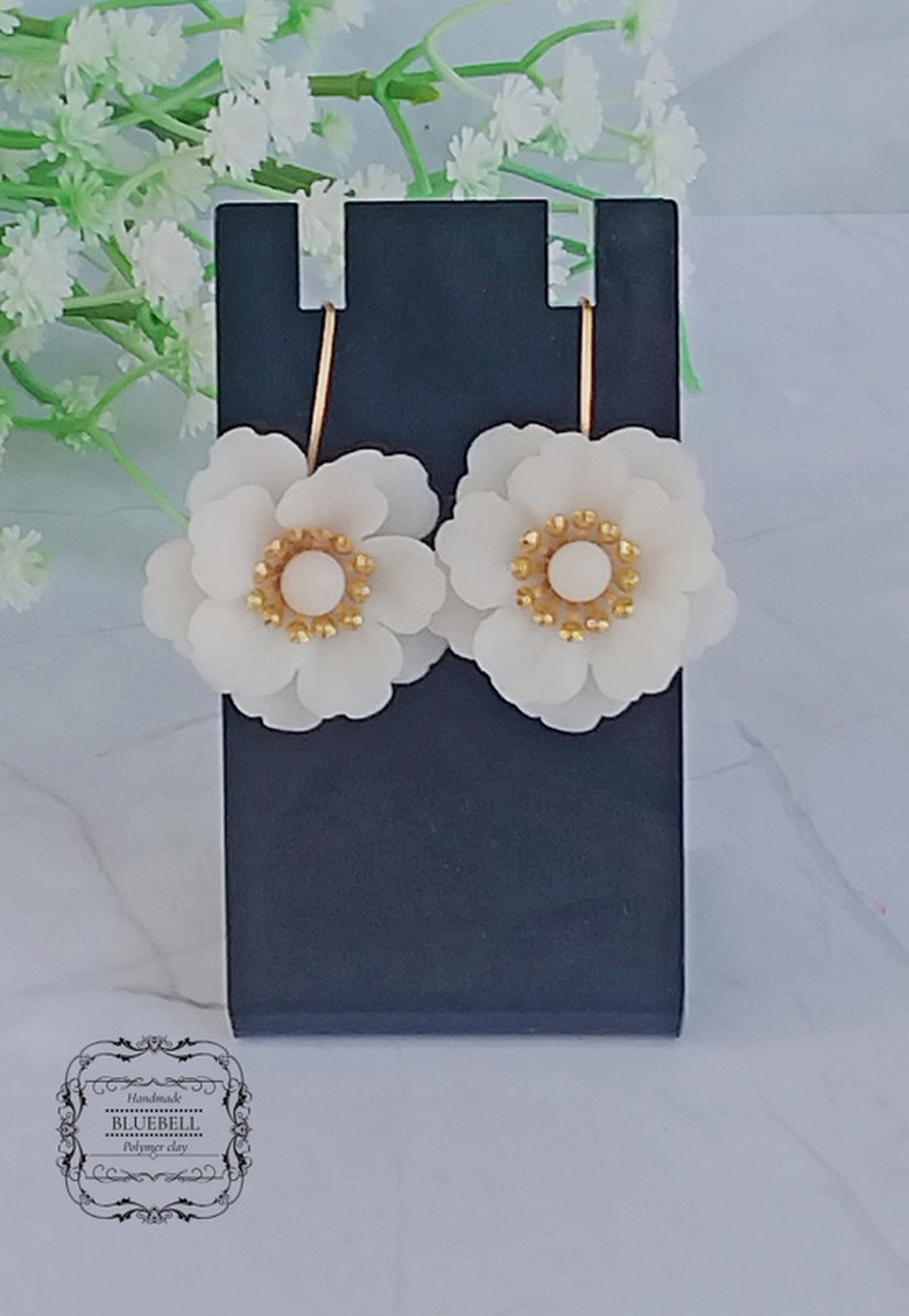 Cercei cu flori - bijuterii - cercei lungi - Artynos.ro Cercei cu flori - bijuterii - cercei lungi - Artynos.ro