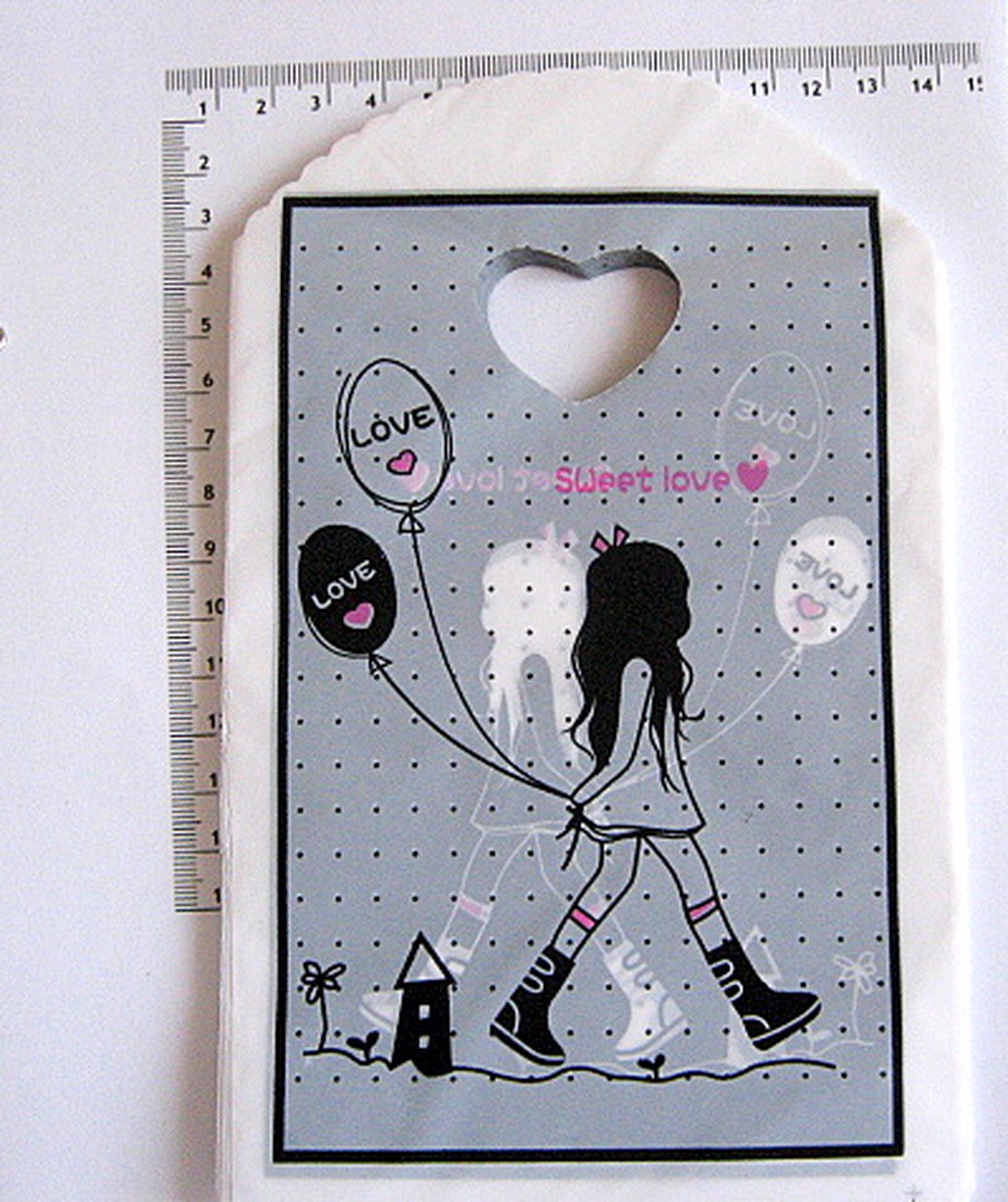 Punguta plastic de cadou cu fete diferite 17563 - crăciun - accesorii cadou de crăciun - hârtii de ambalat cadouri - Artynos.ro