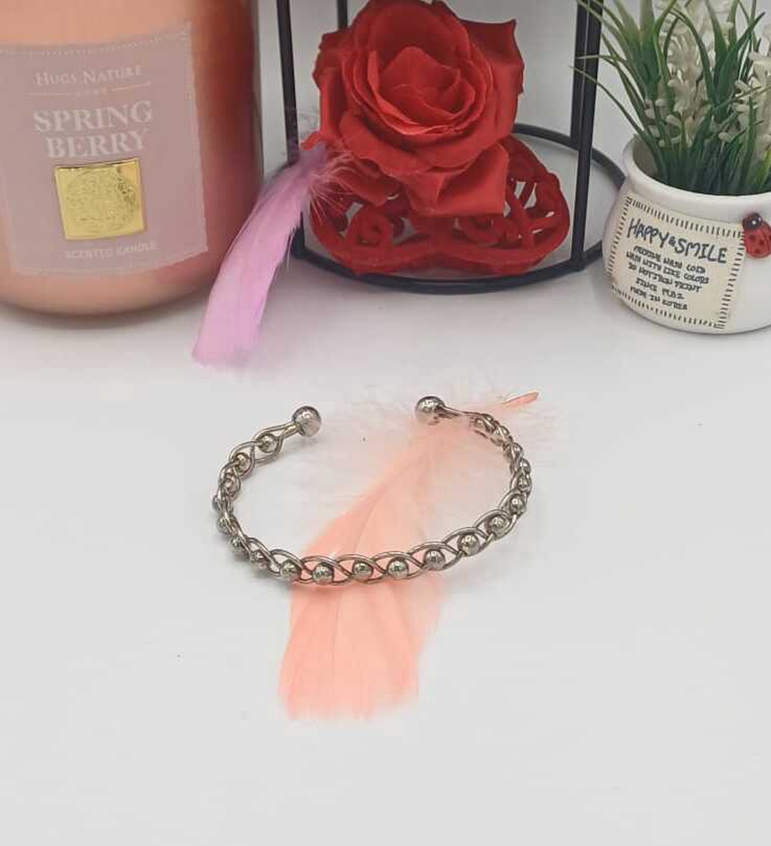 Brățară rigidă tip cuff, realizată din metal argintiu, cu design împletit din zale rotunde - bijuterii - brățări - brățări împletite - Artynos.ro