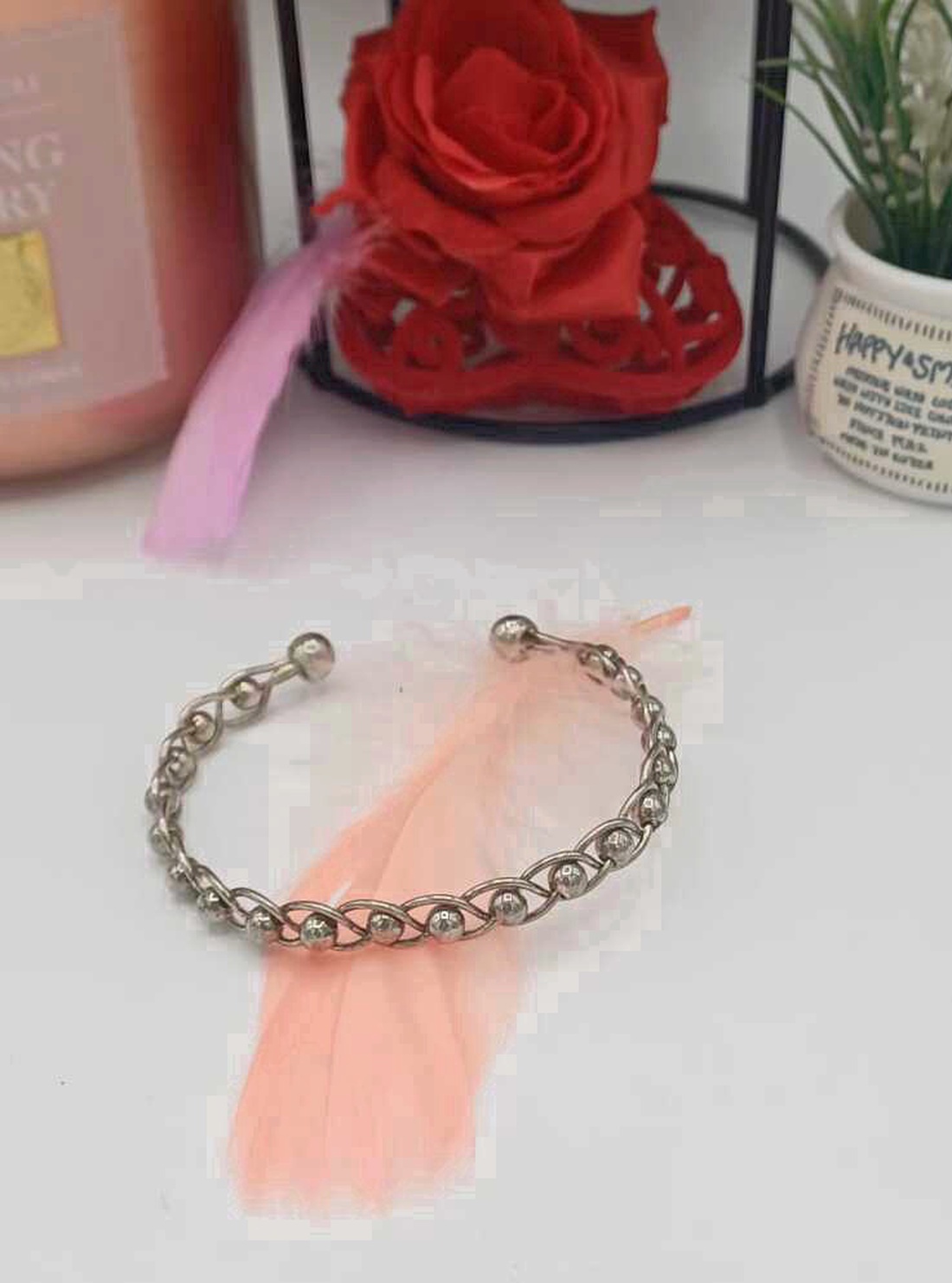 Brățară rigidă tip cuff, realizată din metal argintiu, cu design împletit din zale rotunde - bijuterii - brățări - brățări împletite - Artynos.ro