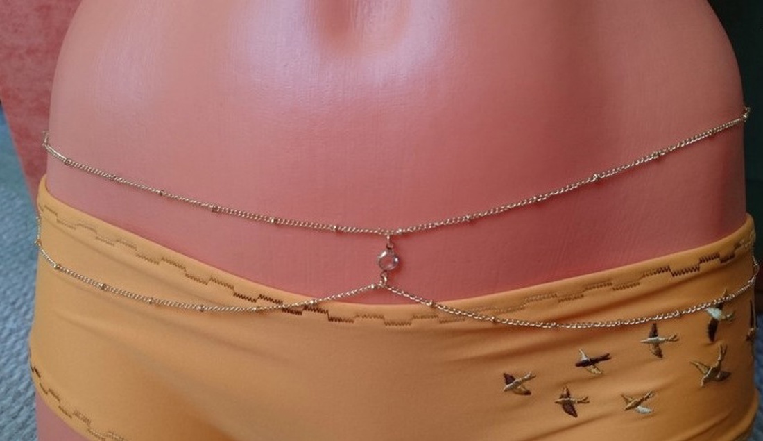 Golden hip chain with one stone - bijuterii - coliere - coliere lungi - Artynos.ro Golden hip chain with one stone - bijuterii - coliere - coliere lungi - Artynos.ro