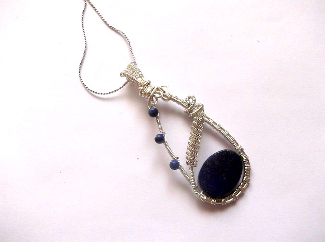 Pandantiv lapis lazuli 38579 - bijuterii - coliere - coliere cu pandantive - Artynos.ro Pandantiv lapis lazuli 38579 - bijuterii - coliere - coliere cu pandantive - Artynos.ro