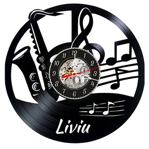 SAXOFONIST-ceas de perete(PERSONALIZABIL) - Artynos.ro