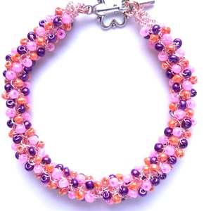 Bratara roz cu margele de sticla roz, violet, portocaliu  - Artynos.ro