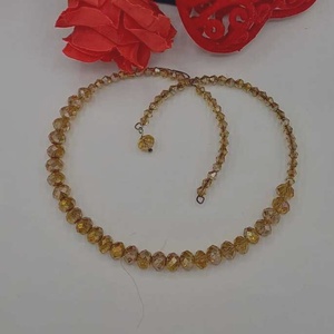Un colier elegant și delicat, realizat din mărgele fațetate din sticlă în nuanțe calde de auriu-miere - bijuterii - coliere - coliere din mărgele - Artynos.ro