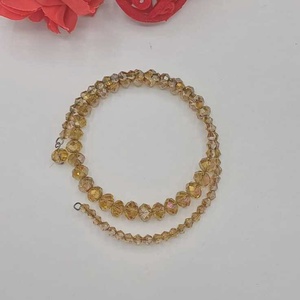 Un colier elegant și delicat, realizat din mărgele fațetate din sticlă în nuanțe calde de auriu-miere - bijuterii - coliere - coliere din mărgele - Artynos.ro