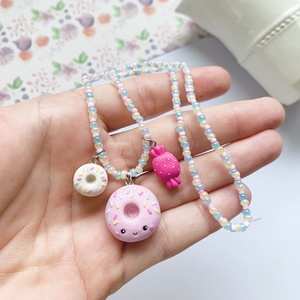 Colier Dulciurele, Craciun, Cadouri de Mos Craciun, Cadouri de Mos Craciun, , Colier cu pandantive lucrate manual din lut polimeric, sub forma de dulciurele: doua gogosele si o ..., ARTYNOS