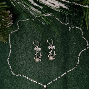 Set argint 925 cu reni și fundițe de zirconiu - crăciun - cadouri de moș crăciun - cadouri de moș crăciun - Artynos.ro