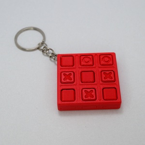 Breloc interactiv X si 0 - geantă și husă - accesorii genți - breloc - Artynos.ro