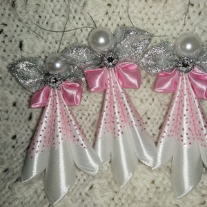 Înger cu fustă roz -  - Artynos.ro