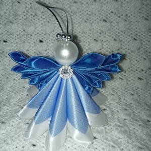 Inger multicolor cu o fusta rotunda - Artynos.ro