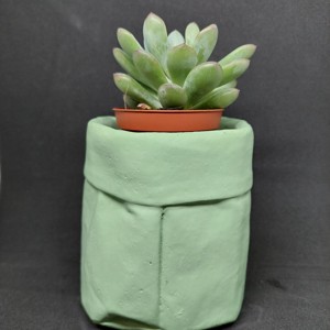Material de culoare verde al ghiveciului de beton în formă de pungă încrețită colorată -  - Artynos.ro